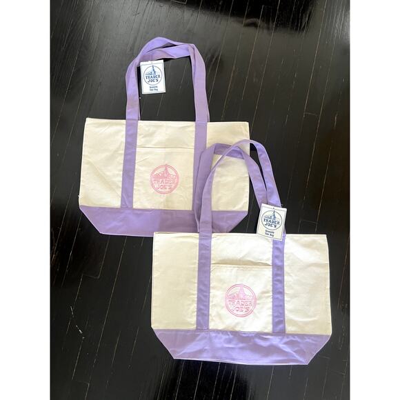 Trader Joe's Handbags - TWO (2) LARGE LAVENDER TRADER JOES TOTE BAGS! BRAND NEW